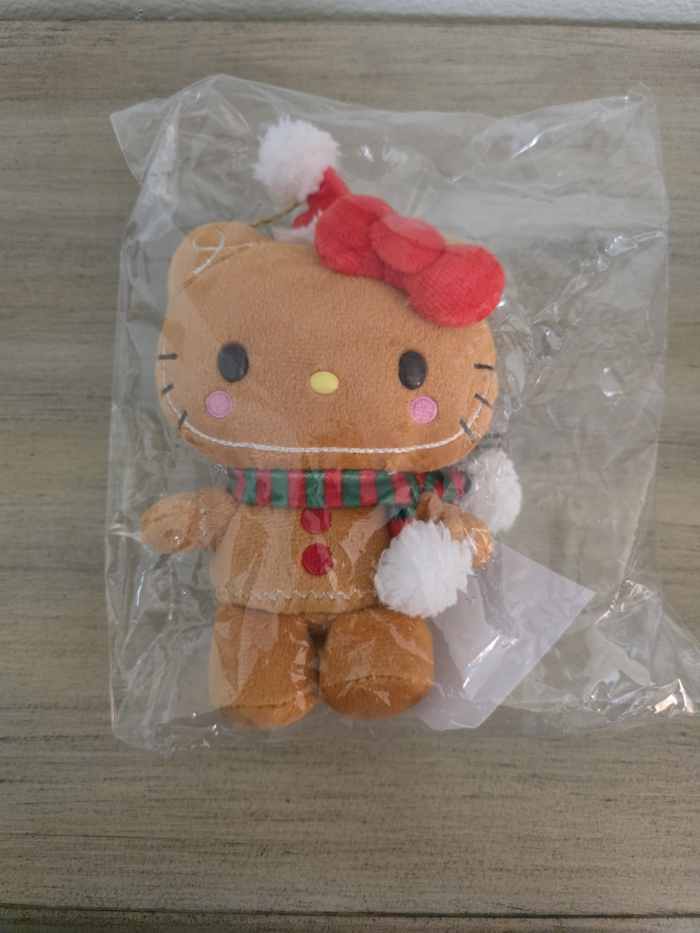 Sanrio Gingerbread Hello Kitty Ornament with Red Bow and Green Red Scarf